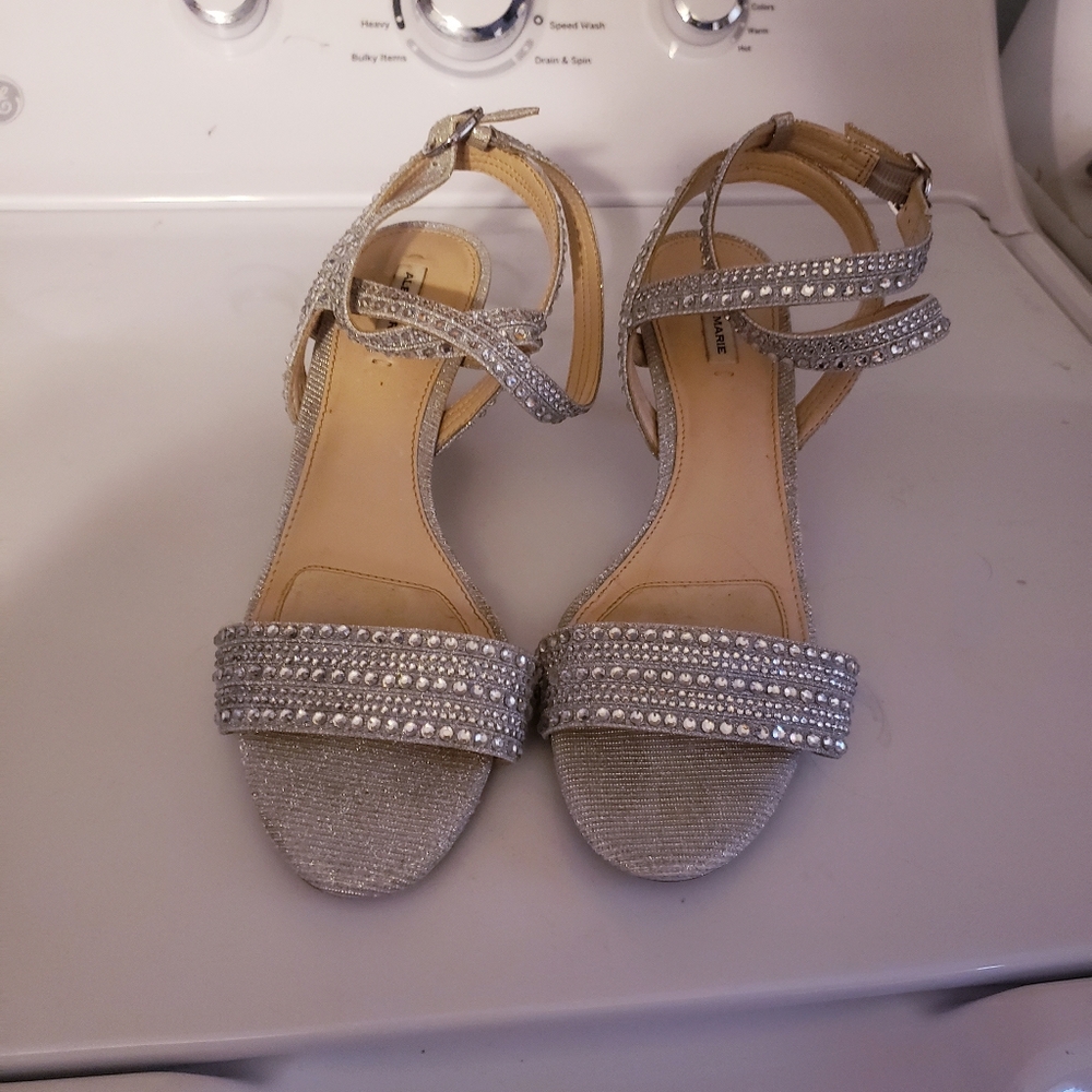 Silver gemstone heels gently worn with ankles strap and padded heel and toe